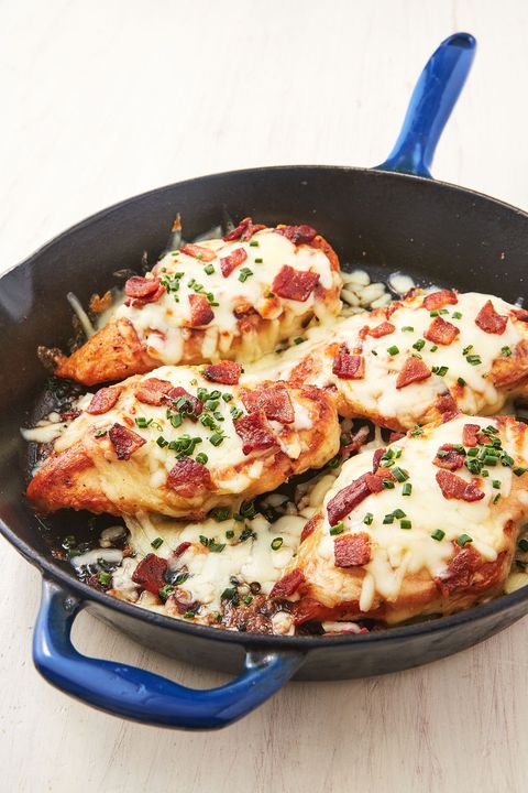 cheesy bacon ranch chicken in a blue dutch oven