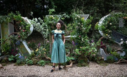 gardener and floral designer hazel gardiner poses with the iconic rhs letters she designed