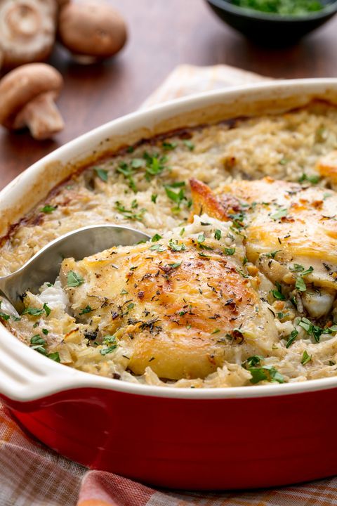 chicken and rice casserole in a red dutch oven