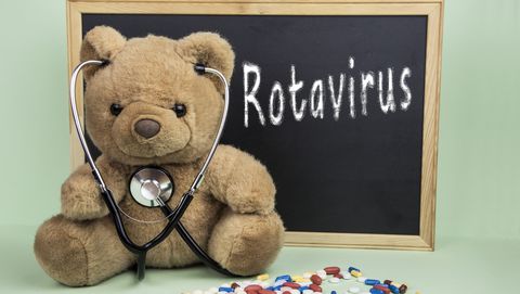 teddybeer met rotavirus op de achtergrond