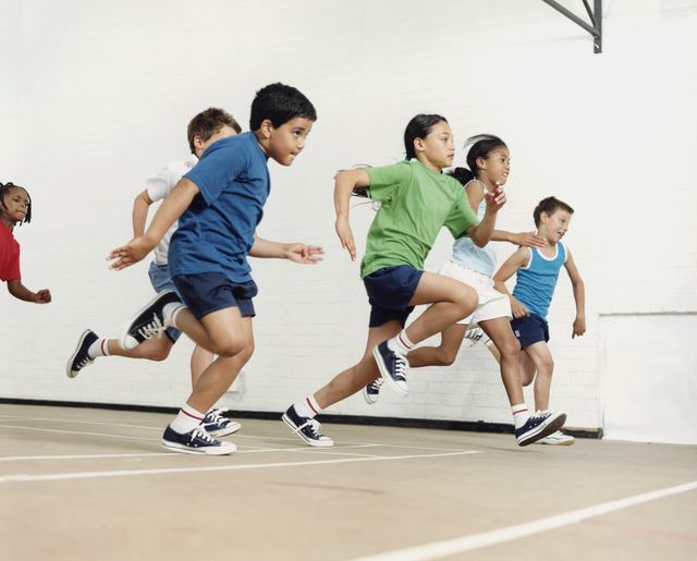 children running in gymnasium