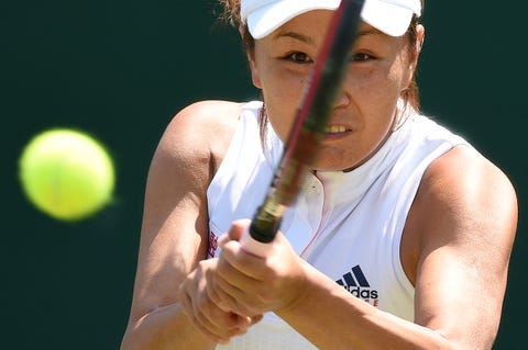 TENNIS-GBR-WIMBLEDON peng hitting a tennis ball very close up photo
