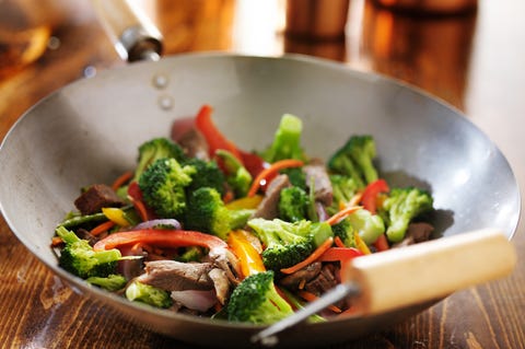 chinese stir fry in metal wok