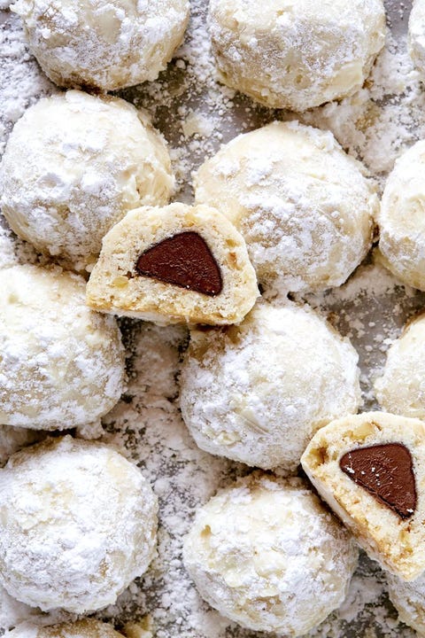 chocolate kiss stuffed snowball cookies