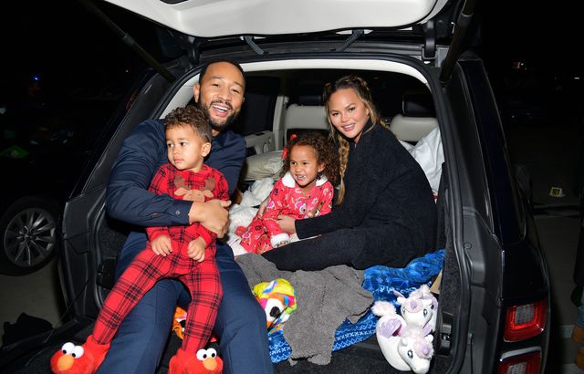 los angeles, california   november 13 editors note this image has been retouched l r miles theodore stephens, john legend, luna simone stephens, and chrissy teigen attend netflixs jingle jangle a christmas journey drive in premiere at the grove on november 13, 2020 in los angeles, california photo by matt winkelmeyergetty images for netflix