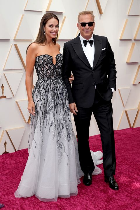 kevin costner and his wife at the 94th oscars