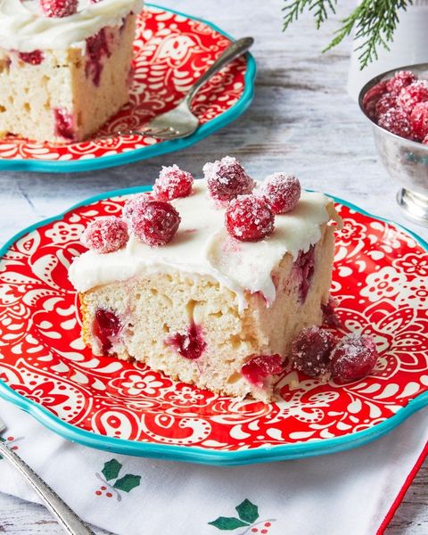 christmas cranberry cake slice on red plate
