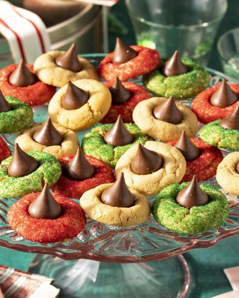 peanut butter blossoms in red and green on cake stand