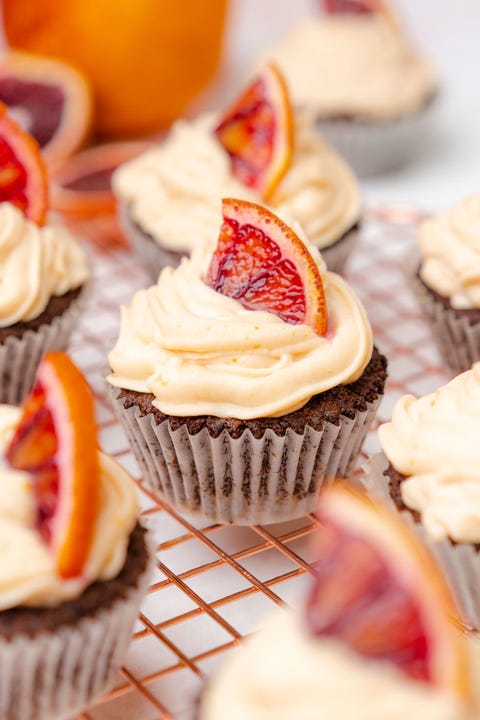 blood orange chocolate cupcakes on wire rack with blood orange slices