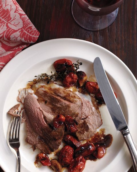 orange and cumin leg of lamb with roasted tomatoes and garlic