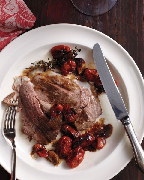 orange and cumin leg of lamb with roasted tomatoes and garlic