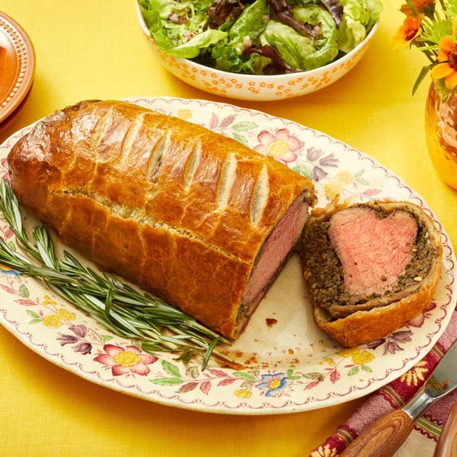 christmas dinner menu beef wellington on yellow background