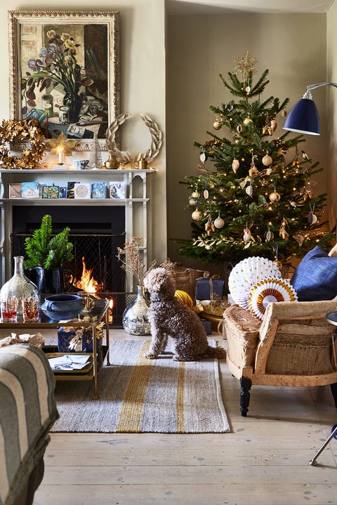 living room decorated in gold for christmas