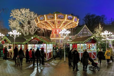 christmas market with carousel in the liseberg amusement park in gothenburg, sweden