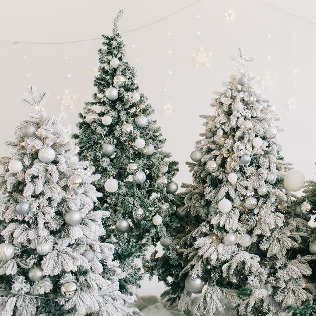 christmas tree decorated with trinkets and garlands new year celebration concept