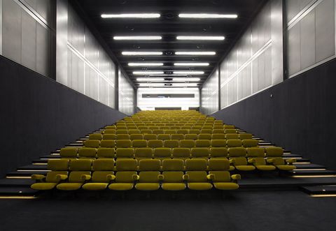Yellow, Architecture, Line, Auditorium, Stairs, Ceiling, Building, Room, Daylighting, Symmetry, 