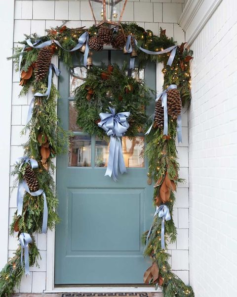 blue door with garland