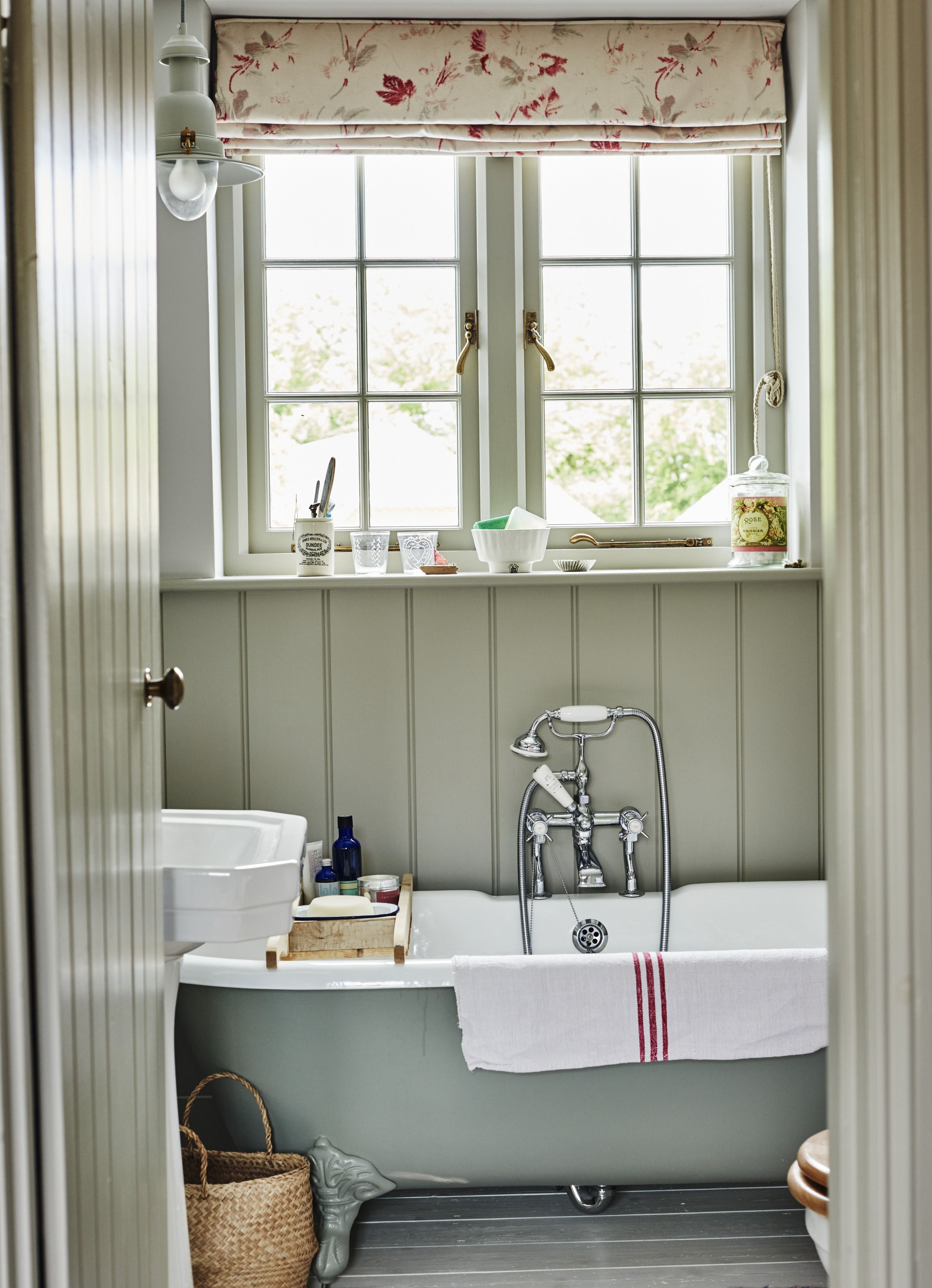 bathroom with clawfoot tub and shower