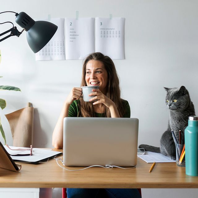 woman working at desk with clip on lamp