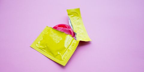 Close-Up Of Condom Packet On Table