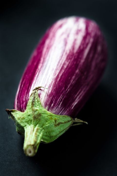 Close-Up Of Eggplant Against Black Background