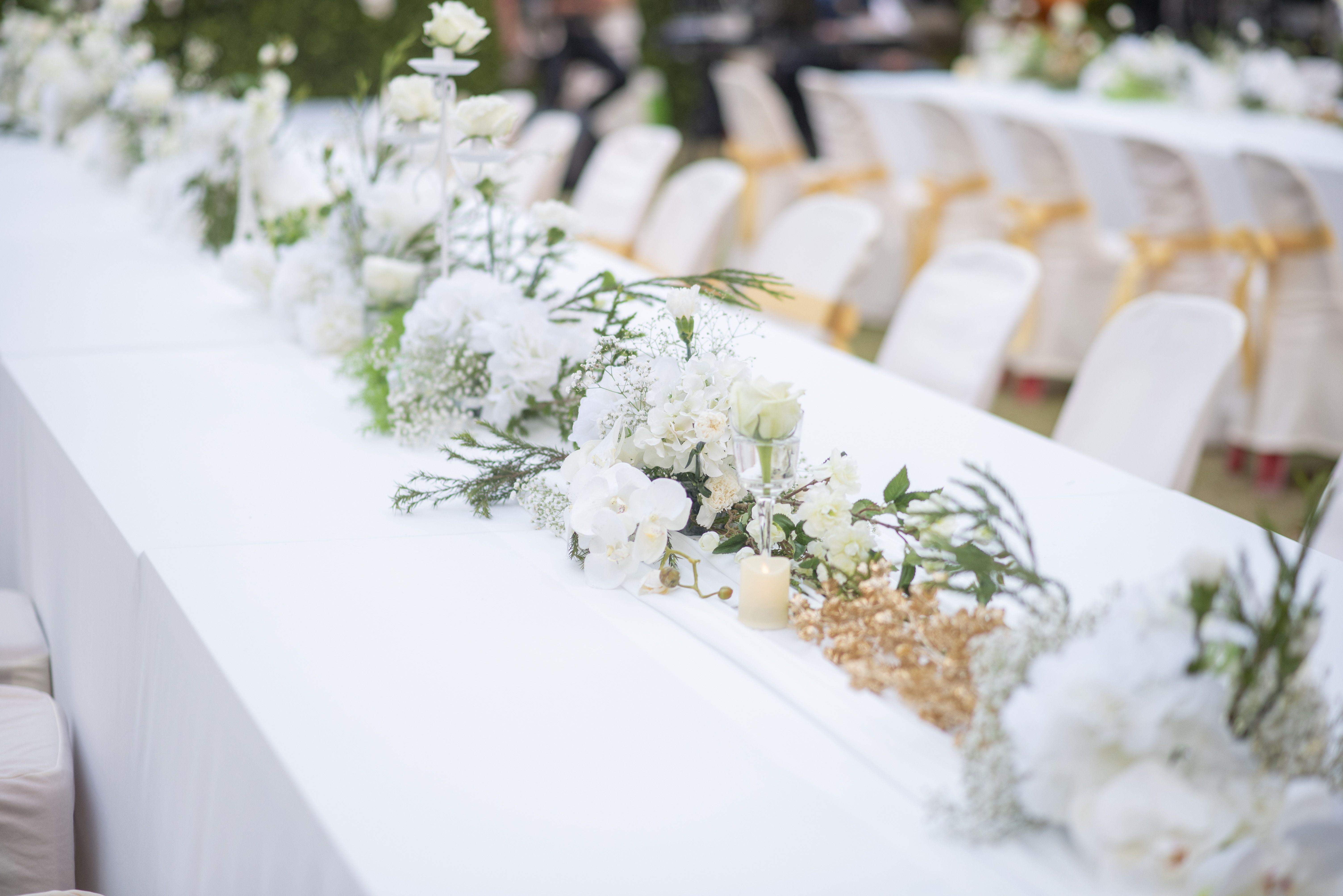 close up of flowers on table at wedding ceremony royalty free image 1147726215 1560231804