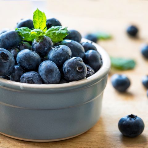 Close-Up Of Fresh Blueberries In Bowl On Table