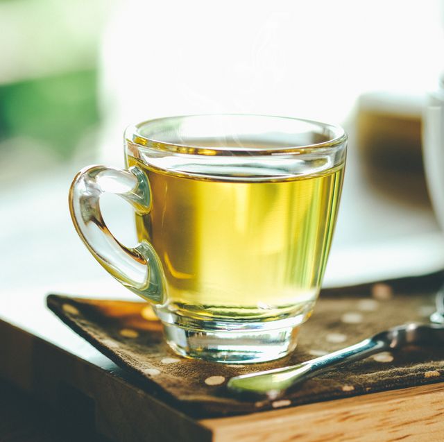 green tea in cup on table