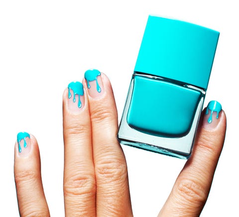 a clear manicure with a teal melted tip design