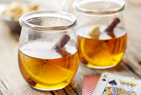 Close-up of hot toddy served in glass mugs on table Close-up of hot toddy served in glass mugs on table