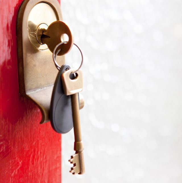close up of house keys in front door