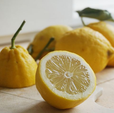 close up of lemon slices on table