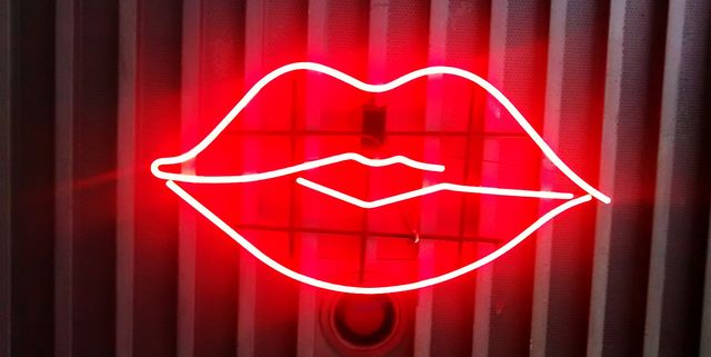 close up of neon lip sign