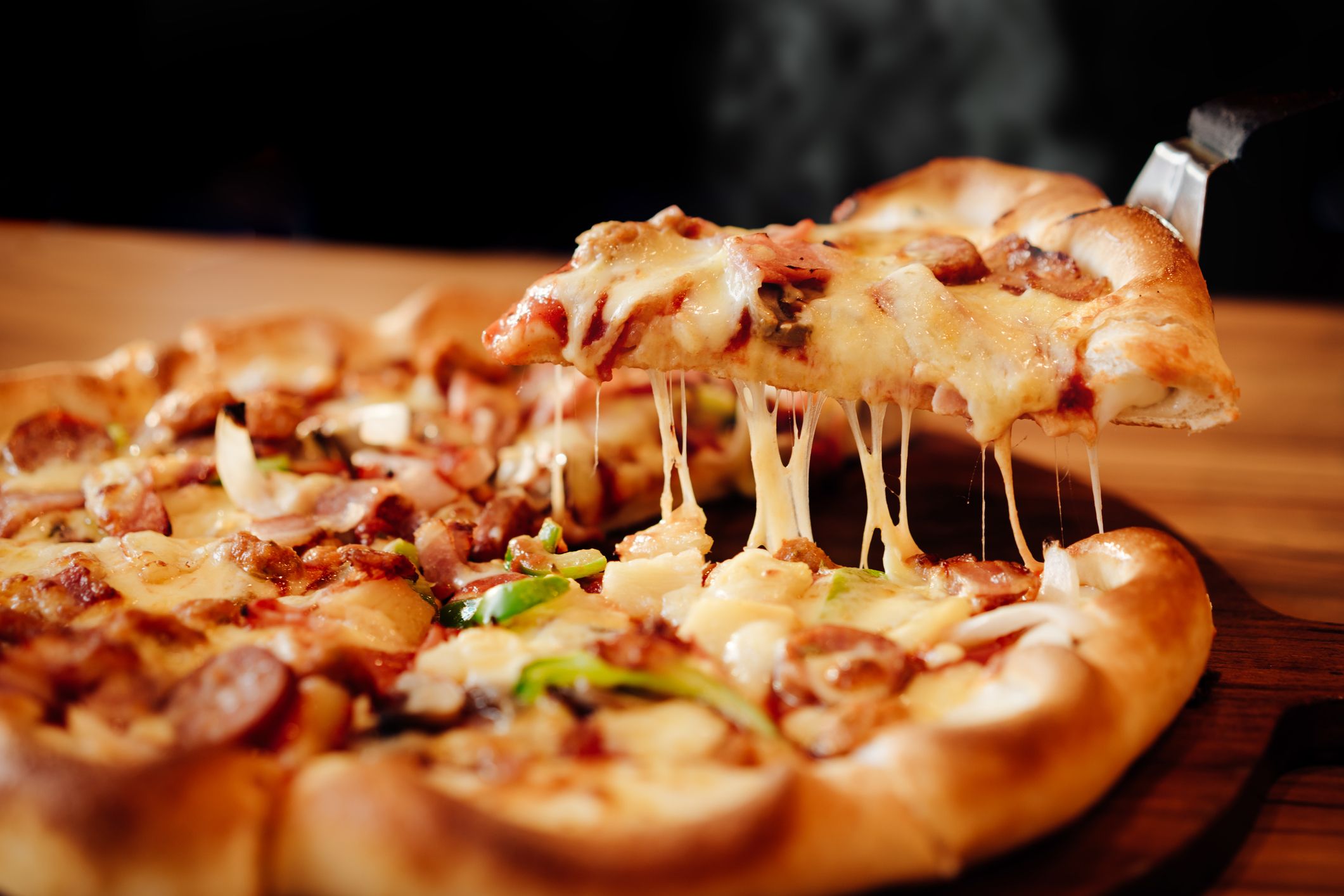close-up-of-pizza-on-table-royalty-free-image-995467932-1559051477