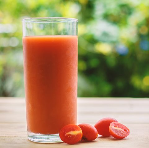 close up of tomato juice on table