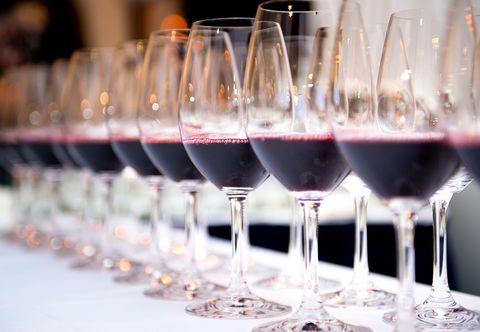 Close-Up Of Wineglass In Row On Table