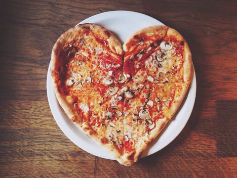 Close-up overhead view of heart shape pizza