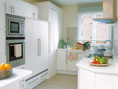 Countertop, Room, Kitchen, Cabinetry, Property, Furniture, Green, Yellow, Interior design, Floor, 