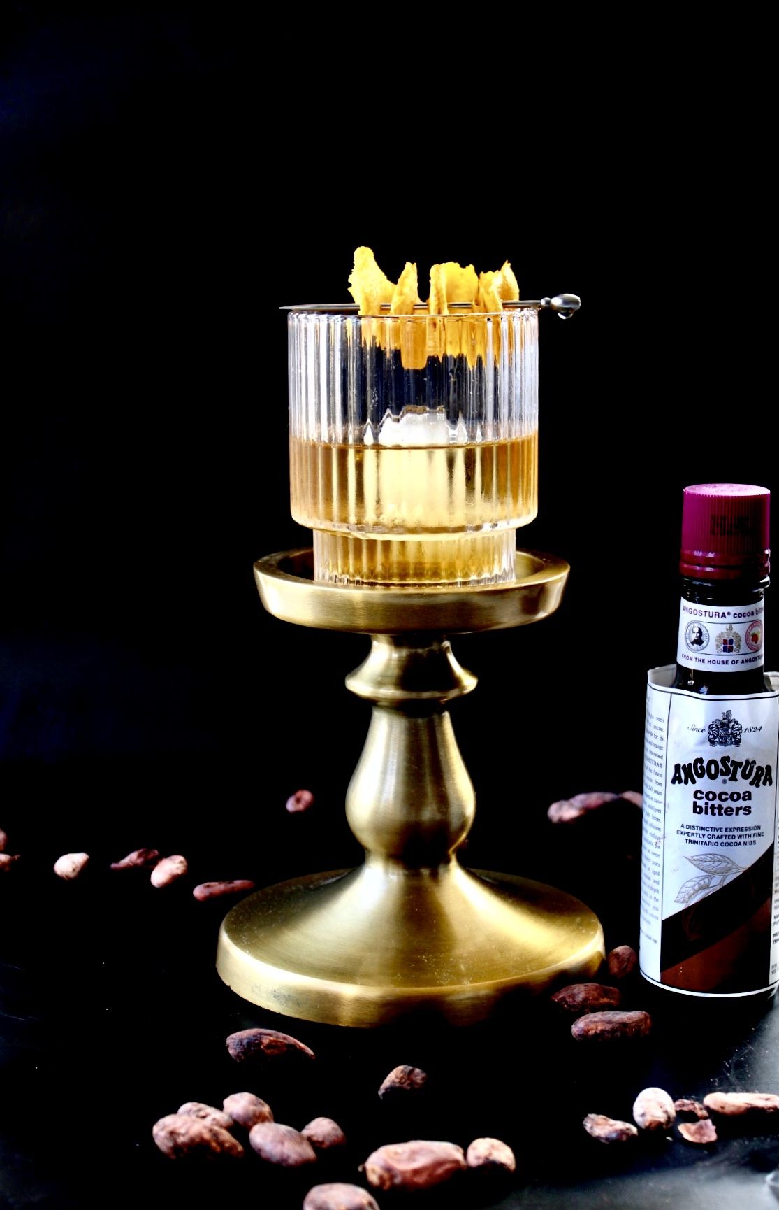 still life with oysters rum glass and silver cup