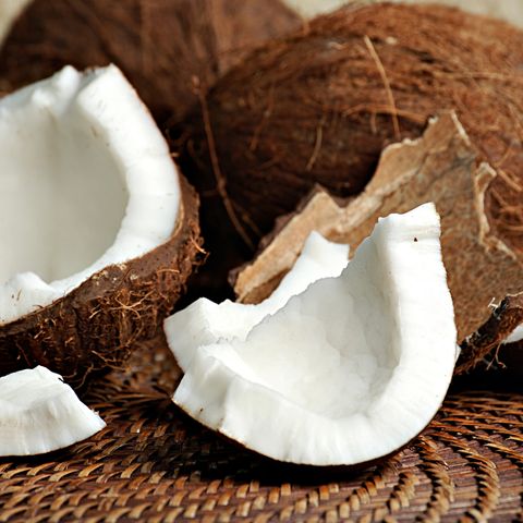 raw coconut meat with whole coconuts for hair mask