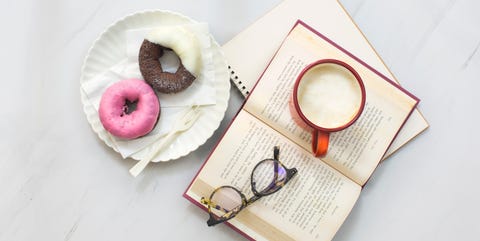 Coffee break time with donuts table top shot.