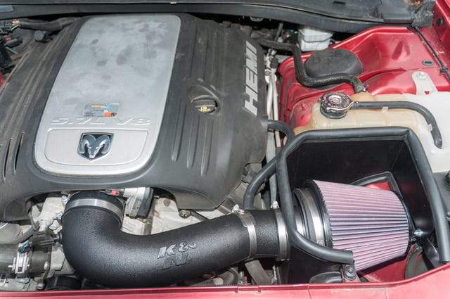 cold air intake installed on a dodge charger hemi v 8 engine