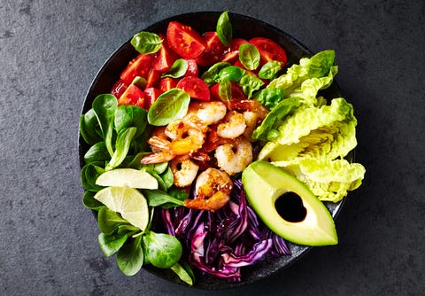 Colorful Poke Bowl with Roasted Sesame Prawns, Red Cabbage, Avocado, Cherry Tomatoes, Corn Salad and Lettuce Colorful Poke Bowl with Roasted Sesame Prawns, Red Cabbage, Avocado, Cherry Tomatoes, Corn Salad and Lettuce