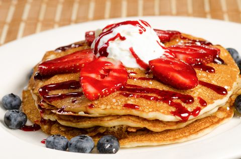 Colorful view of a tasty breakfast or dessert pancake with...