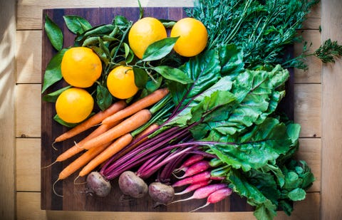 Colourful root vegetables with oranges