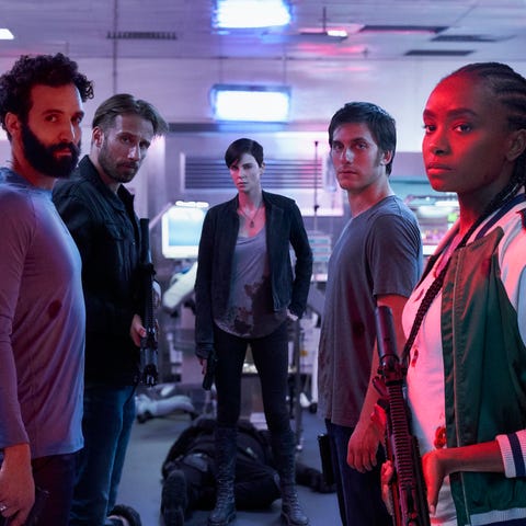 THE OLD GUARD (2020) the old guard 2020 l to r marwan kenzari as joe, matthias schoenaerts as booker, charlize theron as andy, luca marinelli as nicky, kiki layne as nile photo credit aimee spinksnetflix ©2020