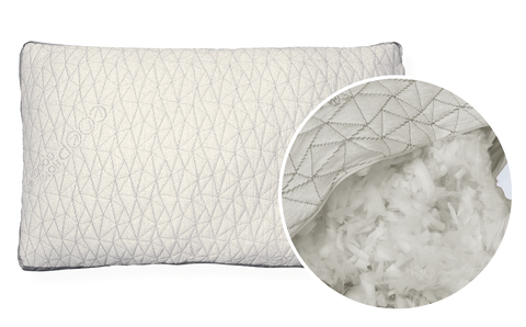 coop home goods pillow with a close up of stuffing