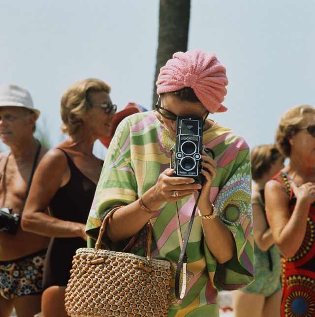 1972 princess grace of monaco taking a photograph at a swimming competition at palm beach, monte carlo photo by hulton archivegetty images