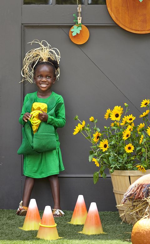willa gray, daughter of cl contributor lauren akins, in kids' corn costume with kernels made from yellow painted egg carton