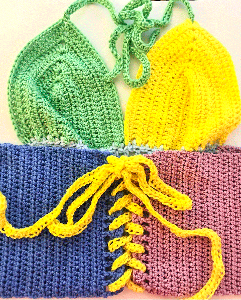 handmade, crocheted crop top in a color block pattern